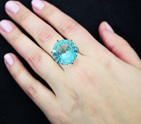 Золотое кольцо с топазом авторской огранки 22,55 карат и синими сапфирами Золото