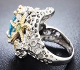 Серебряное кольцо с голубым топазом и перидотами Серебро 925