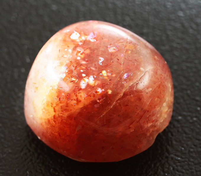 Камни солнца и луны. Орегонский Солнечный камень. Солнечный камень Ангелайт. Красный Солнечный камень. Темно-коричневый Солнечный камень.