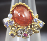 Серебряное кольцо cо спессартином цвета «фанта», родолитом и танзанитами Серебро 925