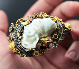 Серебряный браслет с жемчужиной барокко, рубинами и гранатами Серебро 925