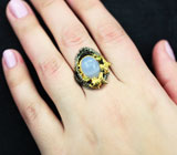 Серебряное кольцо с халцедоном, перидотами и синими сапфирами