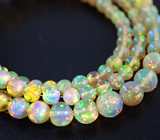 117 кристаллических эфиопских опалов 32 карата на струне 