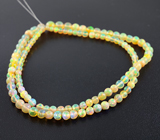 117 кристаллических эфиопских опалов 32 карата на струне 