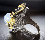 Серебряное кольцо с халцедоном, мозамбикскими гранатами и перидотами