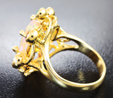 Золотое кольцо с ограненным эфиопским опалом 3,48 карат, сапфирами, изумрудами и танзанитами Золото