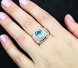 Стильное серебряное кольцо с крупным голубым топазом