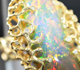 Золотое кольцо с уникальным кристаллическим эфиопским опалом 19 карат и бриллиантами Золото
