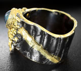 Серебряное кольцо с сапфирами и перидотом