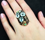 Серебряное кольцо с голубыми топазами, родолитом и мозамбикскими гранатами, хризопразом и цитринами