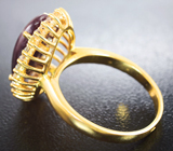 Золотое кольцо со звездчатым корундом 7,06 карата и лейкосапфирами Золото