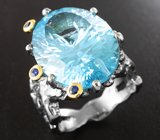 Серебряное кольцо с голубым топазом лазерной огранки 15,48 карата и синими сапфирами