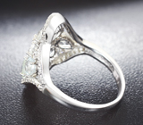Замечательное серебряное кольцо с бесцветными топазами