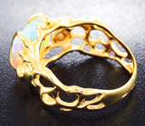 Золотое кольцо с ограненным эфиопским опалом 1,91 карата, цаворитами и красными сапфирами Золото