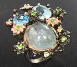Серебряное кольцо с аквамарином, голубыми топазами, диопсидами и перидотами Серебро 925