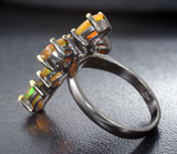 Серебряное кольцо с ограненными эфиопскими опалами и мозамбикским гранатом Серебро 925
