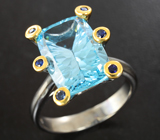 Серебряное кольцо с голубым топазом 8,54 карата лазерной огранки и синими сапфирами Серебро 925