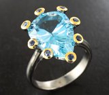 Серебряное кольцо с голубым топазом 9,4 карата и синими сапфирами