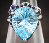Серебряное кольцо с голубым топазом лазерной огранки 9,2 карата и синими сапфирами