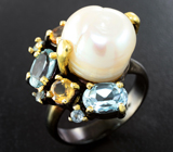 Серебряное кольцо с жемчужиной, голубыми топазами и цитринами