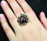 Серебряное кольцо со сливовым аметистом и голубыми топазами