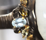 Серебряное кольцо с лунным камнем, голубыми топазами и цитринами Серебро 925