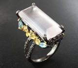 Серебряное кольцо с розовым кварцем, апатитами, голубыми топазами и аметистами