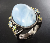 Серебряное кольцо с голубым опалом, топазами и перидотами Серебро 925