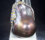 Серебряное кольцо с цветной жемчужиной барокко 36,1 карата и синими сапфирами