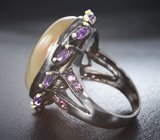 Серебряное кольцо с рутиловым кварцем, аметистами и родолитами