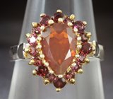 Серебряное кольцо с ограненным эфиопским опалом и мозамбикскими гранатами