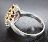 Серебряное кольцо с ограненным эфиопским опалом и мозамбикскими гранатами
