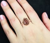 Серебряное кольцо с ограненным эфиопским опалом и мозамбикскими гранатами