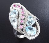 Изысканное cеребряное кольцо с голубыми топазами и сапфирами Серебро 925
