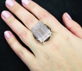 Серебряное кольцо с розовым кварцем и родолитами