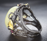 Серебряное кольцо с кабошоном желтого опала, ограненными эфиопскими опалами и родолитами Серебро 925