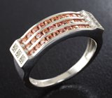 Превосходное серебряное кольцо с сапфирами бриллиантовой огранки и бесцветными топазами Серебро 925