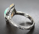 Серебряное кольцо с кристаллическим эфиопским опалом 3,85 карата и сапфирами