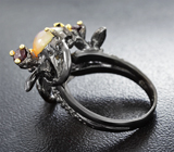Серебряное кольцо c кристаллическим эфиопским опалом и родолитами