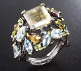 Серебряное кольцо с флюоритом, родолитом, голубыми топазами, желтыми турмалинами и перидотами Серебро 925