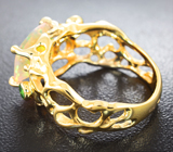 Золотое кольцо с топовым ограненным эфиопским опалом 1,74 карата и цаворитами Золото