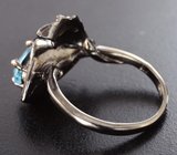 Серебряное кольцо с голубым топазом и перидотом