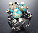 Серебряное кольцо с говлитом и голубыми топазами
