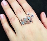 Ажурное серебряное кольцо с голубыми топазами и синими сапфирами