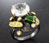 Серебряное кольцо с бесцветным кварцем, диопсидом и перидотами Серебро 925