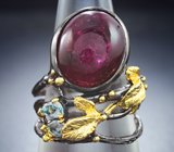 Серебряное кольцо с рубином и голубыми топазами
