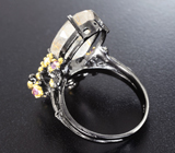 Серебряное кольцо с рутиловым кварцем, бесцветными топазами и аметистами