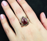 Серебряное кольцо с рубином 13,83 карата и голубыми сапфирами