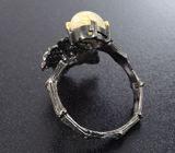 Серебряное кольцо с кристаллическим эфиопским опалом и родолитами Серебро 925