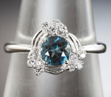 Прелестное серебряное кольцо с насыщенно-синим топазом
